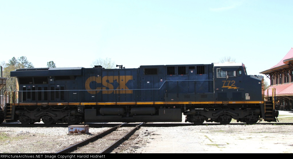 CSX 772 pushes train U341-27 across the diamonds